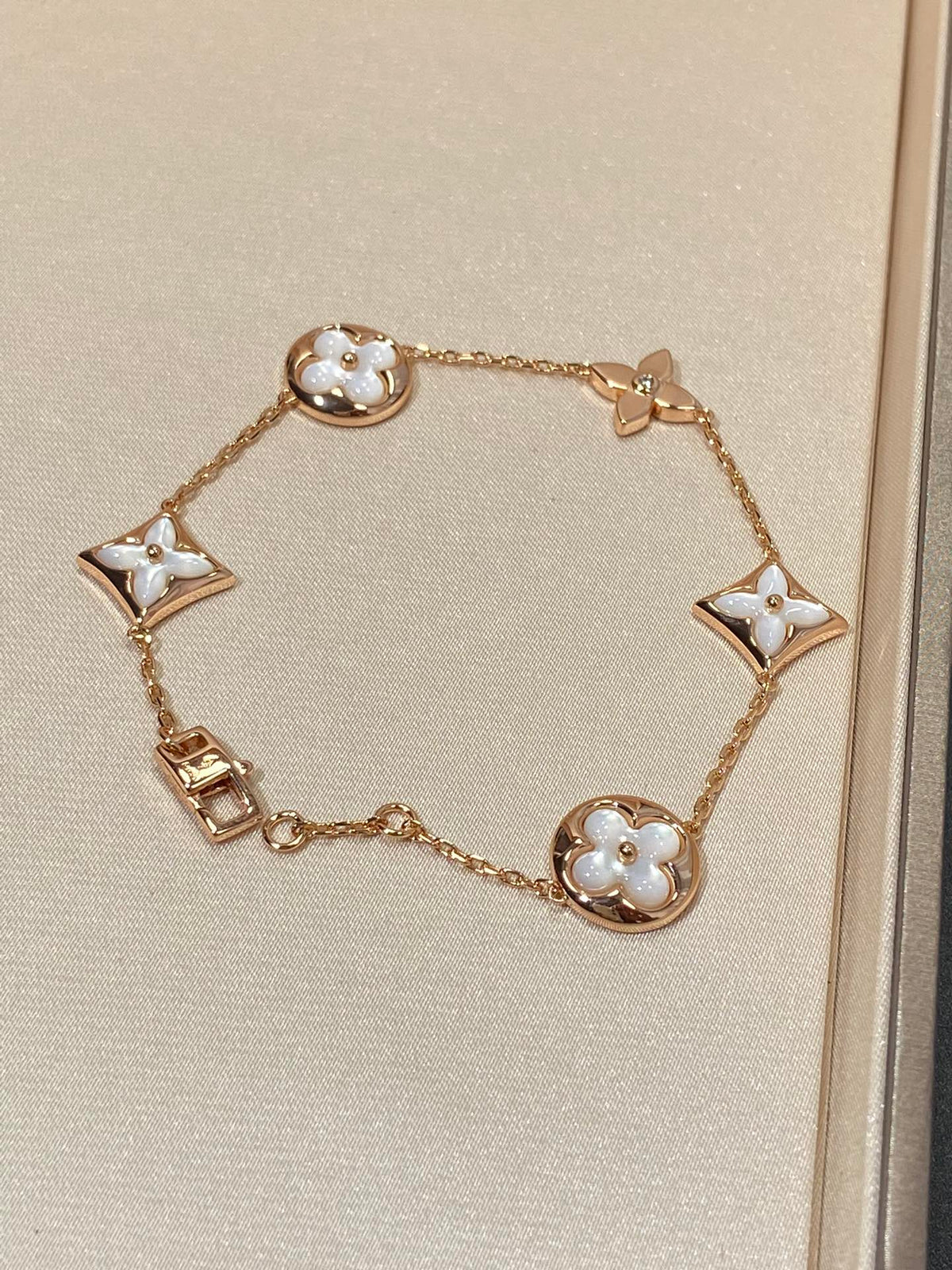 [Cadisa]STAR AND SUN 5 MOTIF MOP PINK GOLD BRACELET