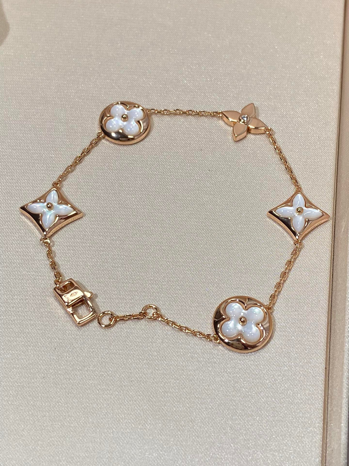 [Cadisa]STAR AND SUN 5 MOTIF MOP PINK GOLD BRACELET