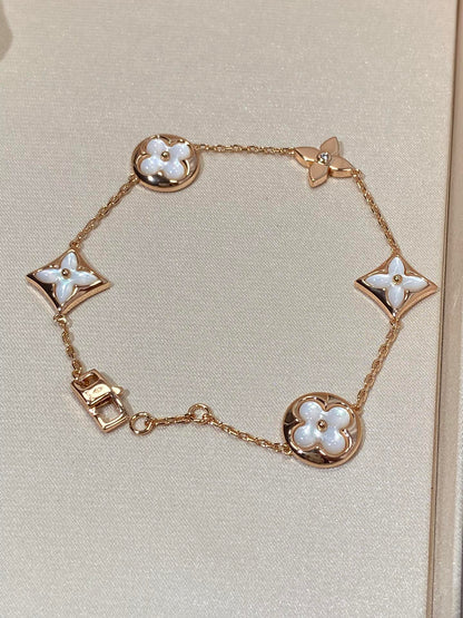 [Cadisa]STAR AND SUN 5 MOTIF MOP PINK GOLD BRACELET