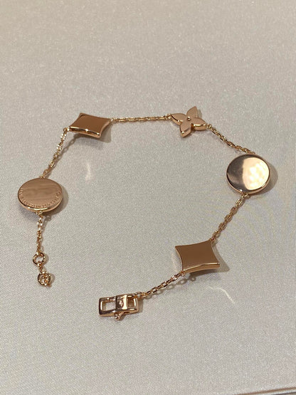 [Cadisa]STAR AND SUN 5 MOTIF MOP PINK GOLD BRACELET
