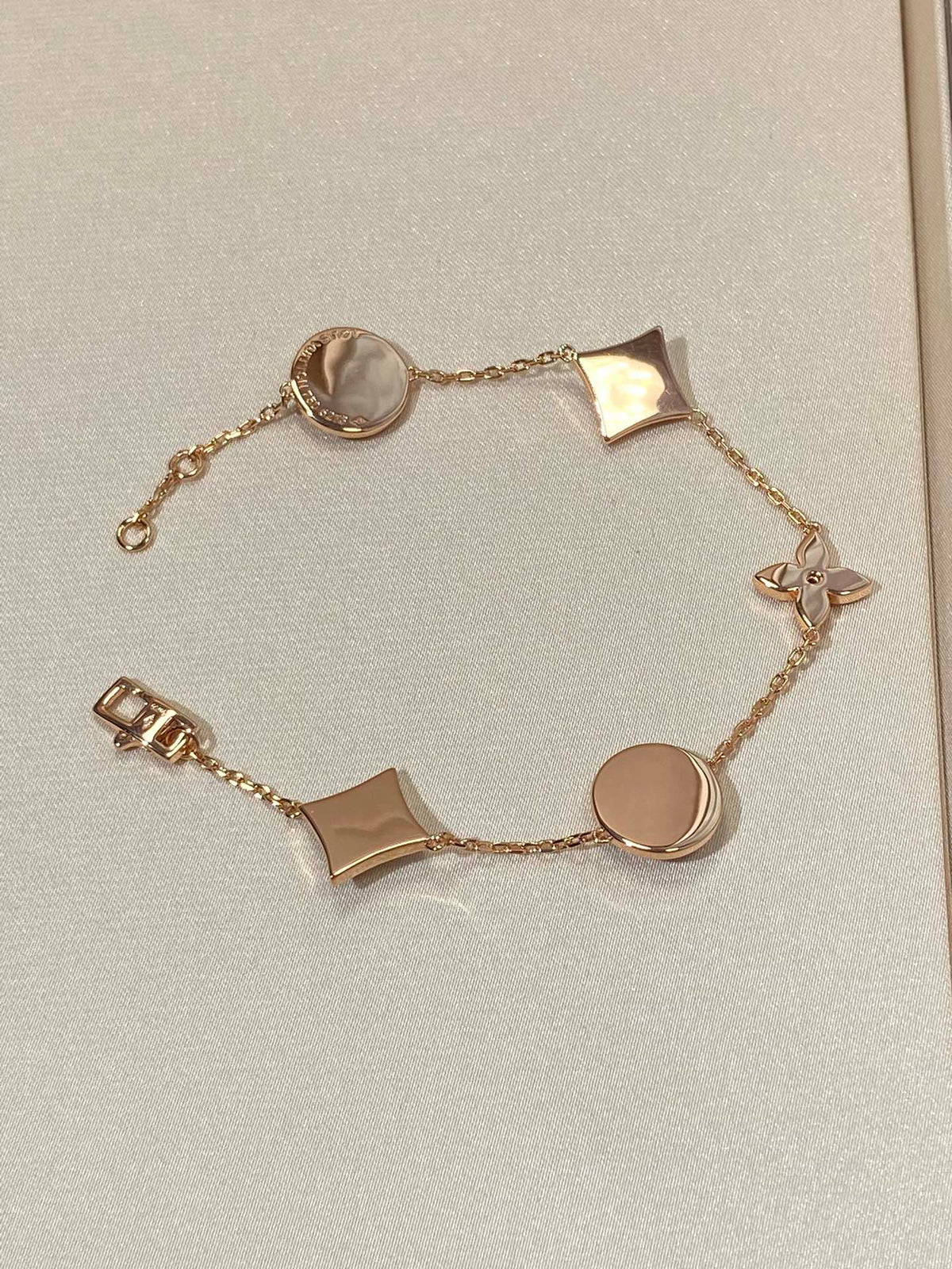 [Cadisa]STAR AND SUN 5 MOTIF MOP PINK GOLD BRACELET