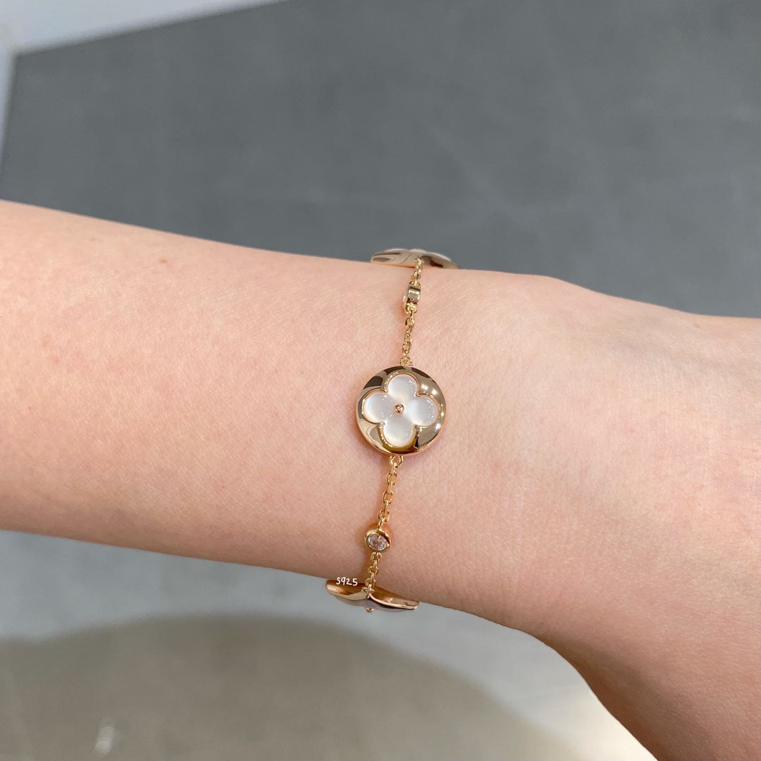 [Cadisa]STAR AND SUN 4 MOTIF WHITE MOP PINK GOLD BRACELET