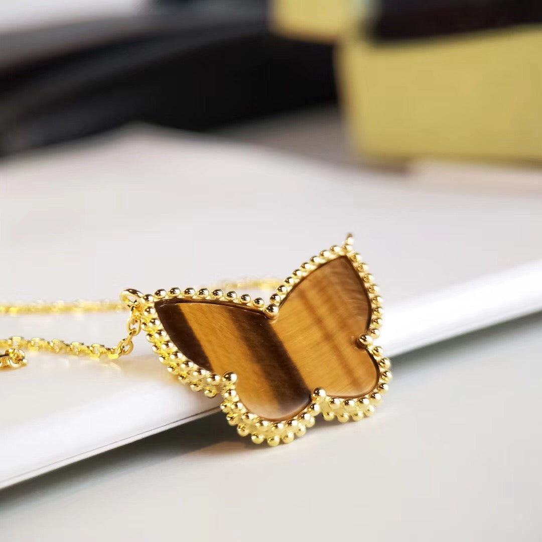 [Cadisa] TIGER__ EYE BUTTERFLY NECKLACE