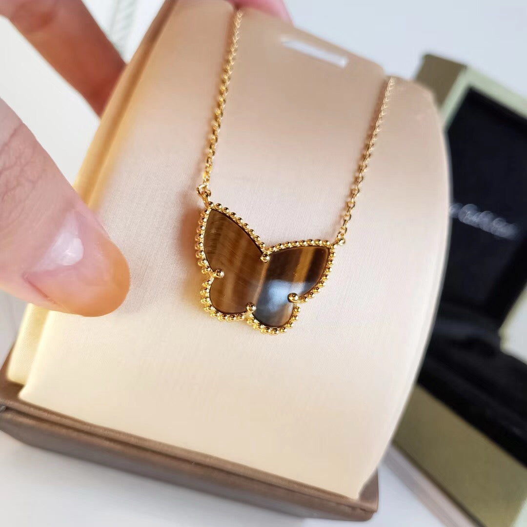 [Cadisa] TIGER__ EYE BUTTERFLY NECKLACE