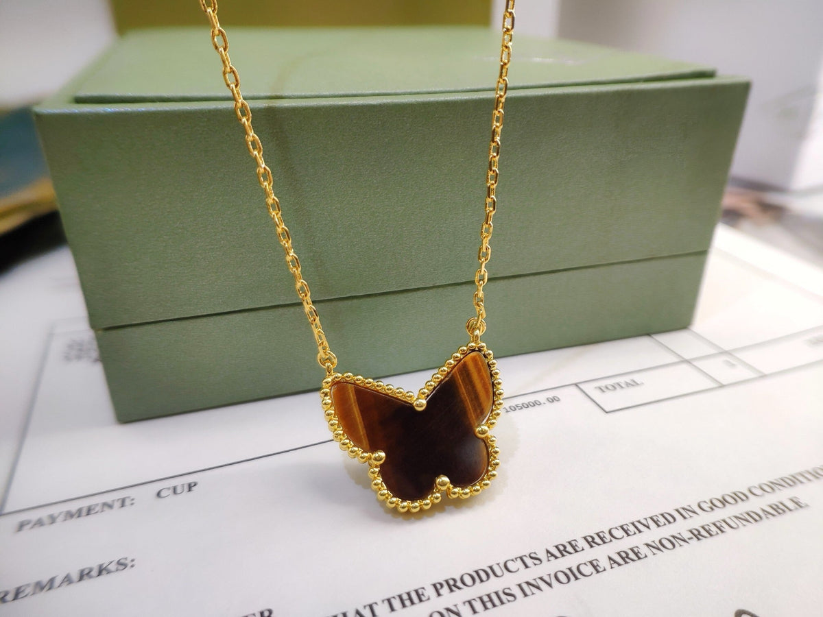 [Cadisa] TIGER__ EYE BUTTERFLY NECKLACE